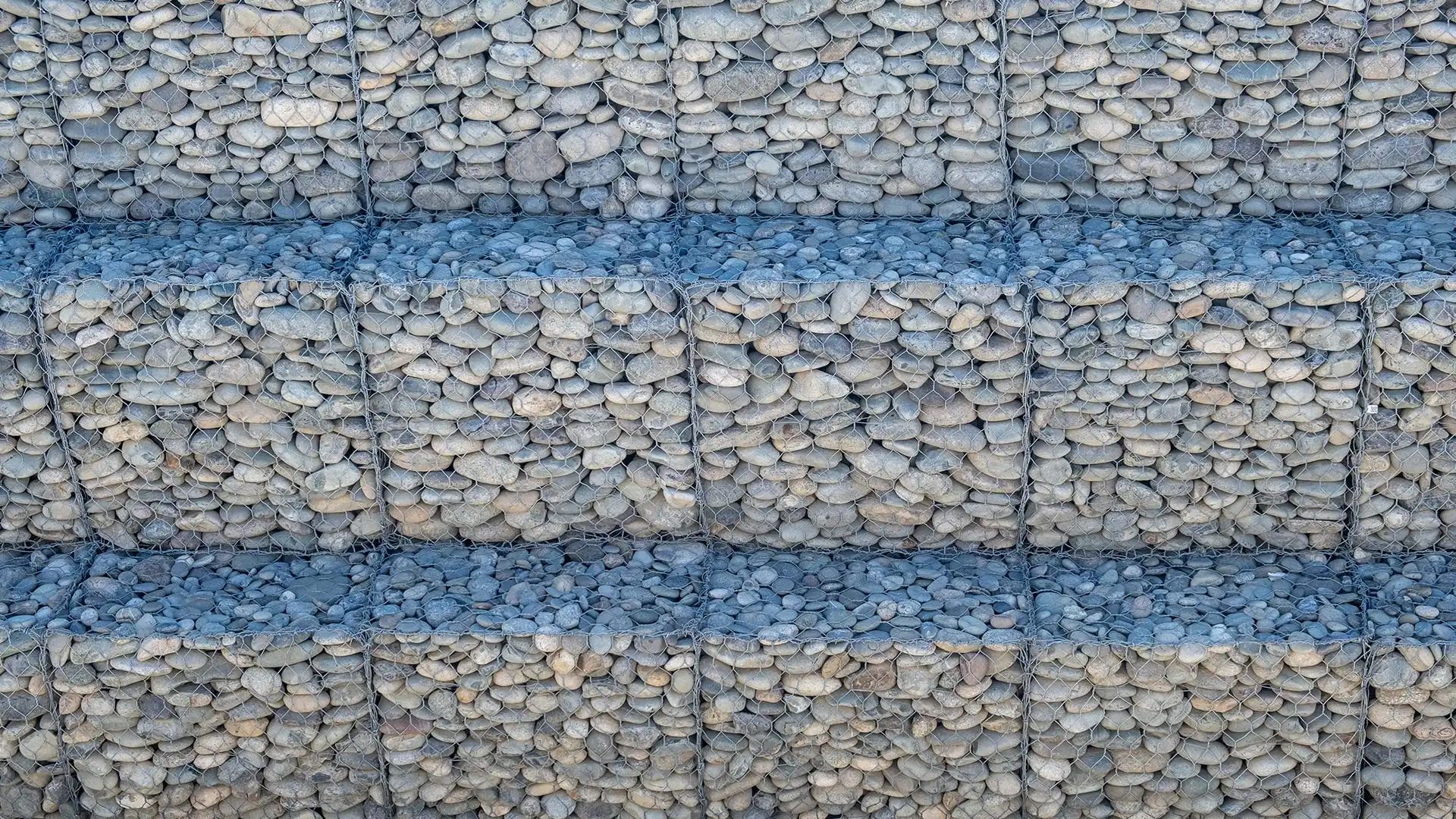 gabions_a-stone-dam-made-of-small-stones-strengthening-th-min-min